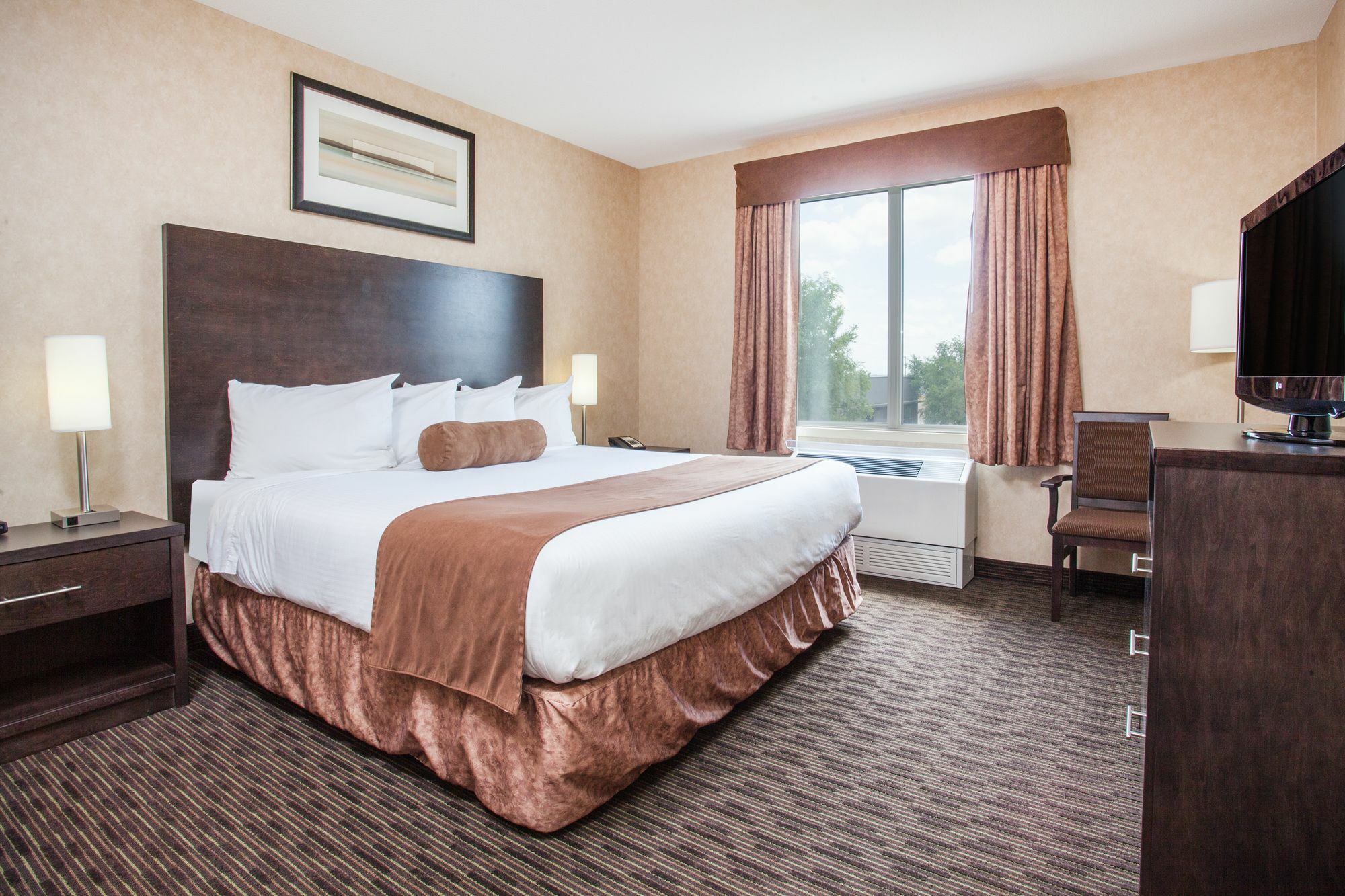 Ramada By Wyndham Estevan Экстерьер фото